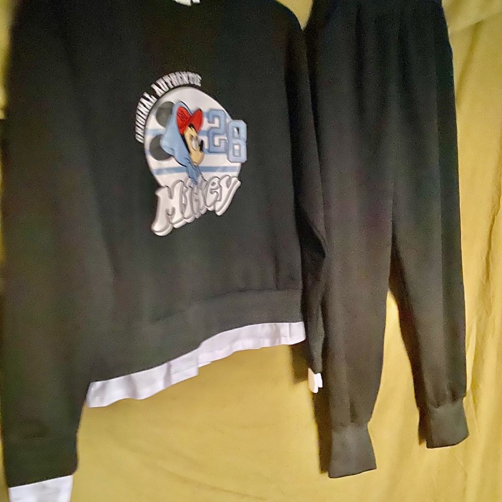 Mickey Mouse Jeggins Black with white layered on sleeves and bottom .